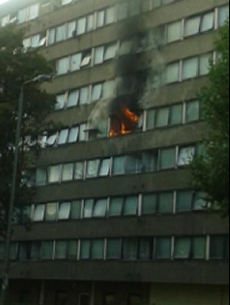 Firefighters rescue 18 following blaze in council flats