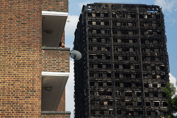 Grenfell fire doors provided only 15 minutes resistance to flames, police reveal