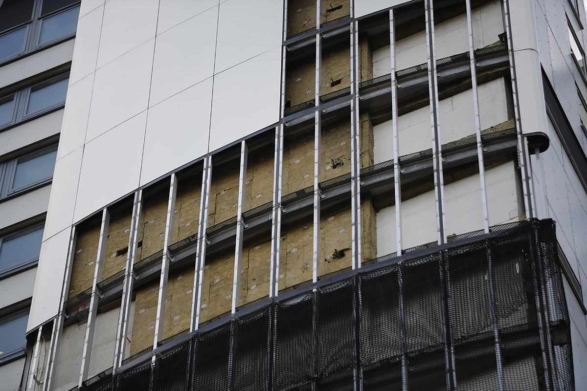 Insurers' cladding tests contradict government results on fire breaks