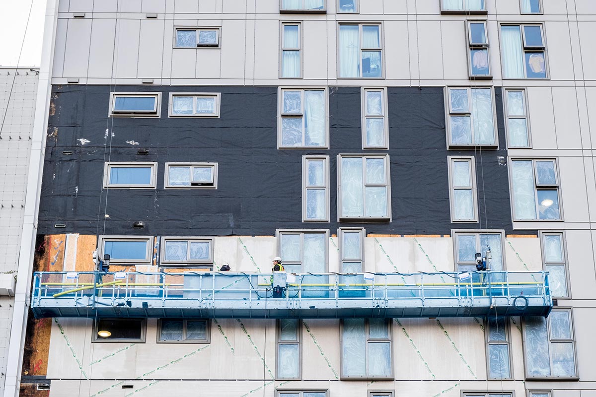 Medium-rise buildings with dangerous cladding can apply for funds as long-awaited scheme opens
