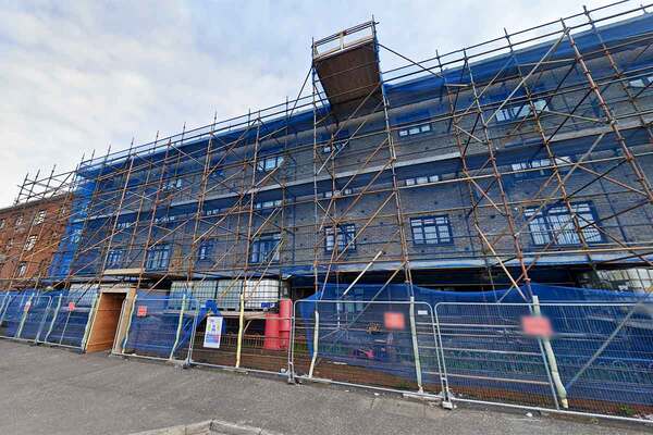 NIHE left with ‘eye-watering’ scaffolding bill after repair delays to housing block