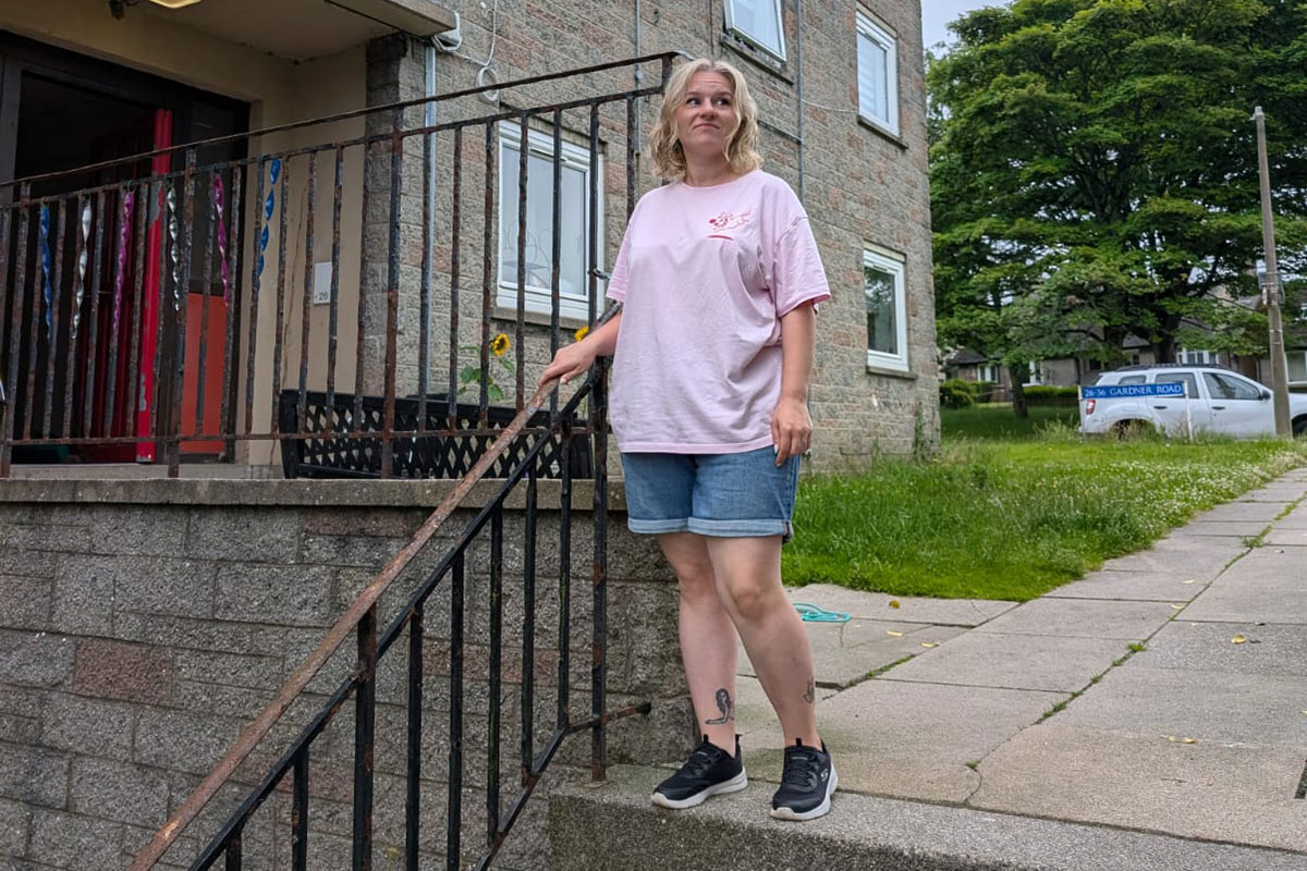 Resident Kirstylee Murray standing outside her home Resident Kirstylee Murray standing outside her home