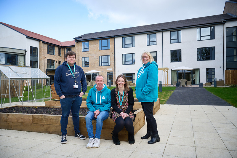 Home Group staff outside Watergate Court, an 82-home community well-being scheme in Gateshead (picture: Home Group) Home Group staff outside Watergate Court, an 82-home community well-being scheme in Gateshead (picture: Home Group)