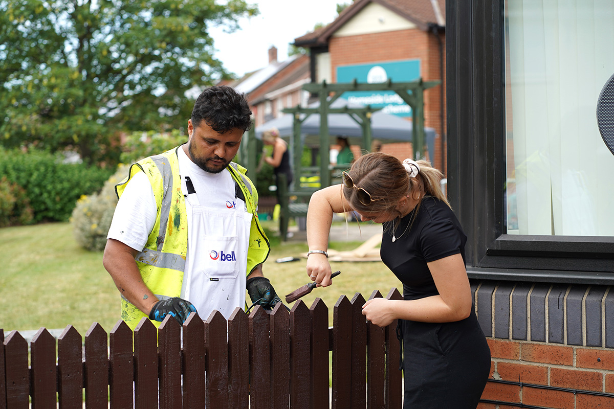 A Home Group colleague and a contractor at a community service in Wallsend. Home Group offers staff two volunteer days per year (picture: Home Group) A Home Group colleague and a contractor at a community service in Wallsend. Home Group offers staff two volunteer days per year (picture: Home Group)