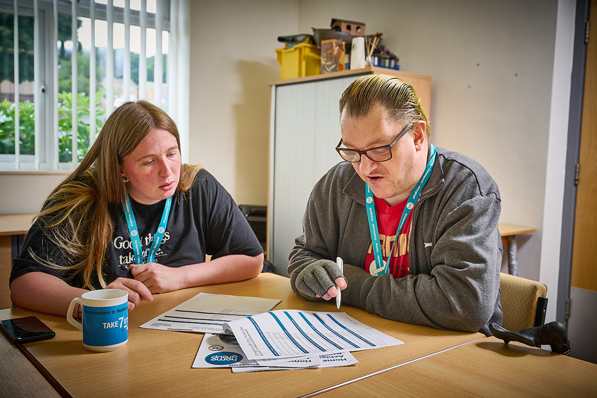 A Home Group customer goes through paperwork with a colleague at a service in County Durham (picture: Home Group) A Home Group customer goes through paperwork with a colleague at a service in County Durham (picture: Home Group)