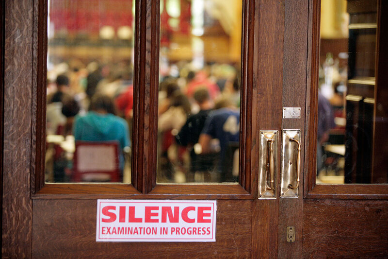 People taking an exam People taking an exam