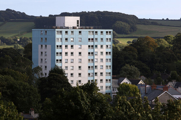 Tower block battered by Storm Goretti as debris falls from roof onto cars below
