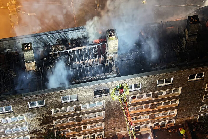 A fire taking place in a block of London council flats A fire taking place in a block of London council flats