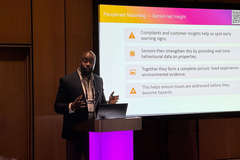 Alex Allen speaking at a housing festival Alex Allen speaking at a housing festival