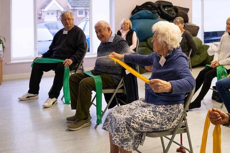 Older residents doing an exercise class Older residents doing an exercise class