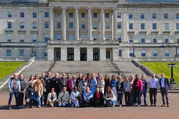 International homelessness leaders visit Belfast to learn from success of youth programme