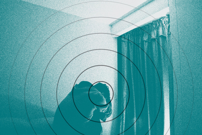 Composite image of person in a bedroom with a target graphic overlaid